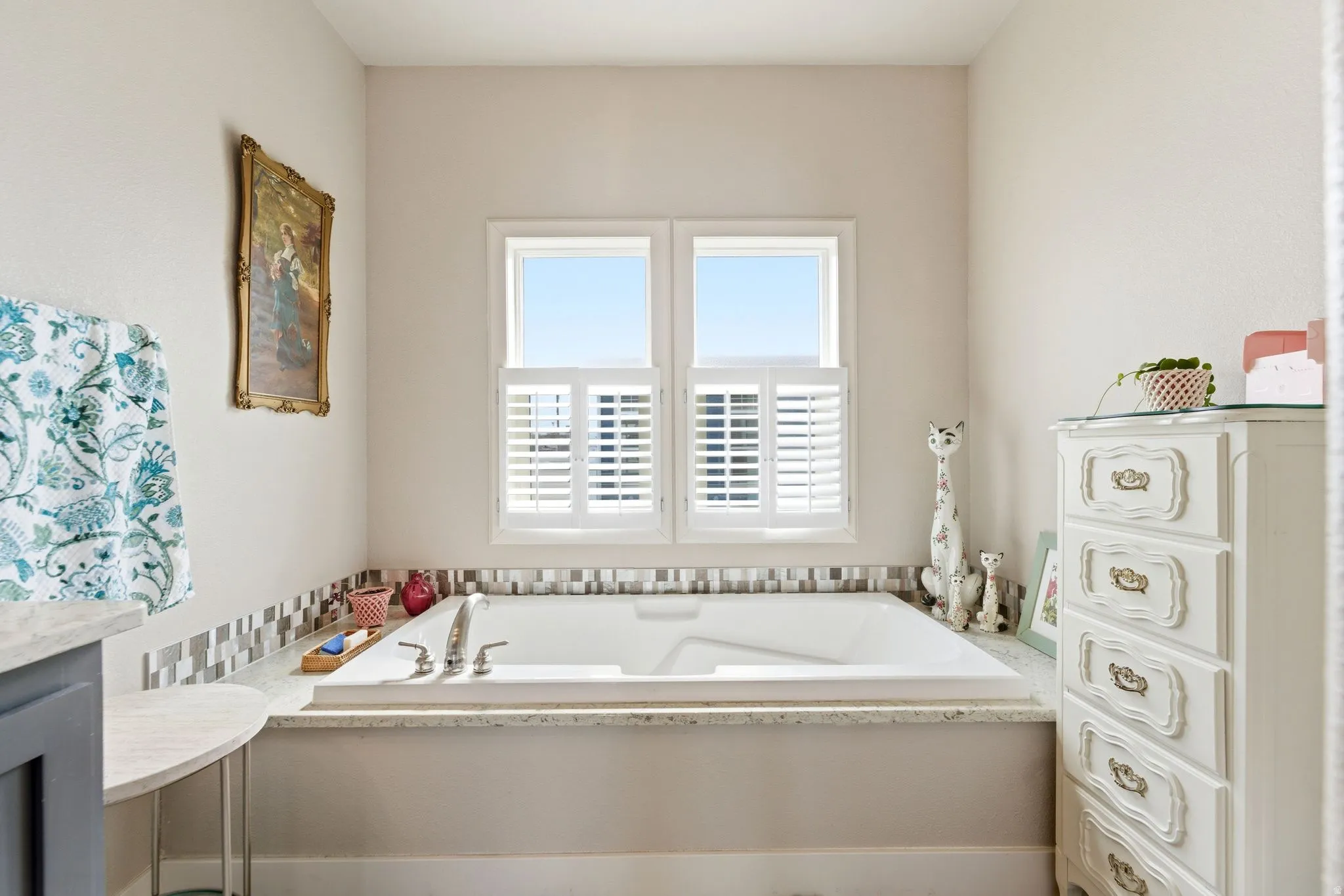 Full bath featuring a bath and vanity