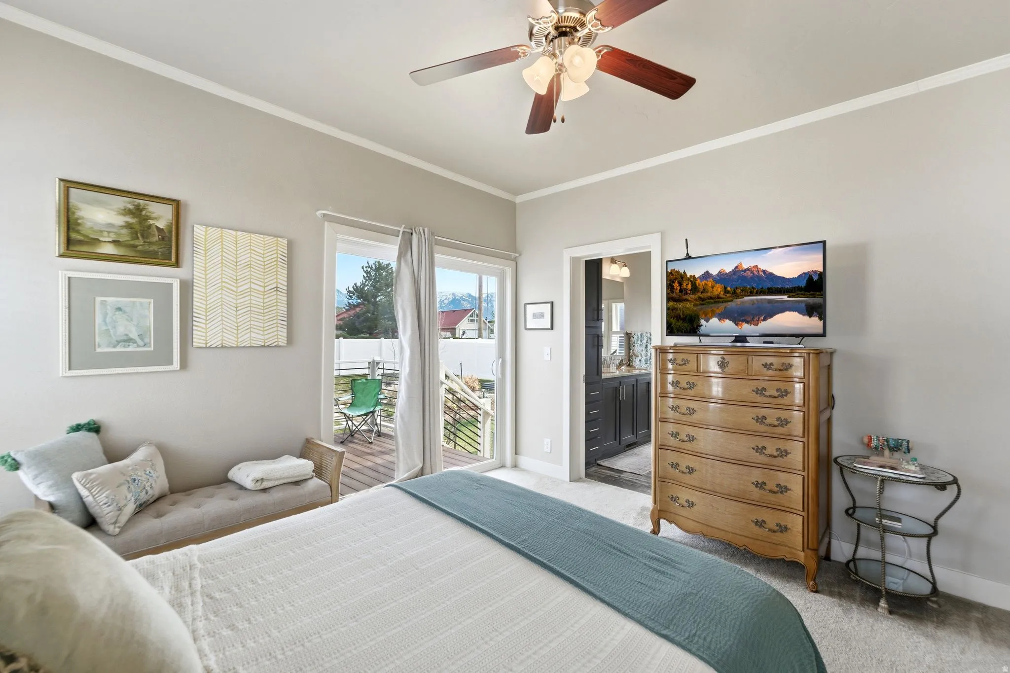 Bedroom featuring access to outside, light carpet, ornamental molding, and ceiling fan