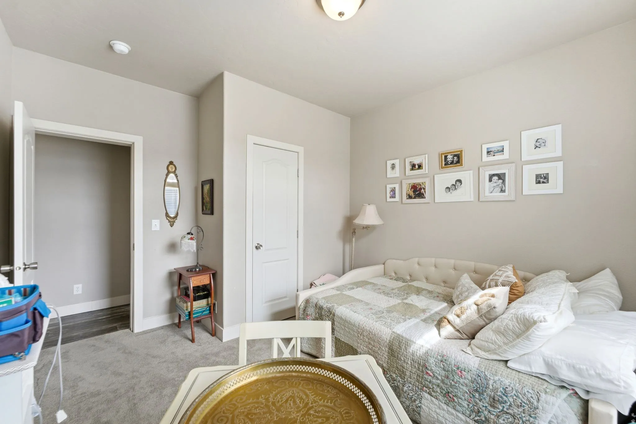 Bedroom featuring baseboards and carpet floors