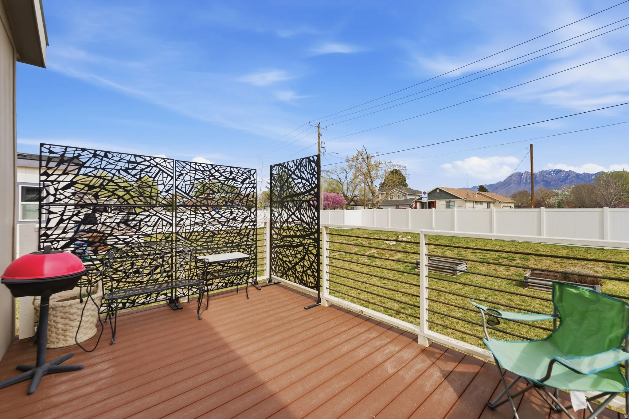 Deck featuring a mountain view and grilling area