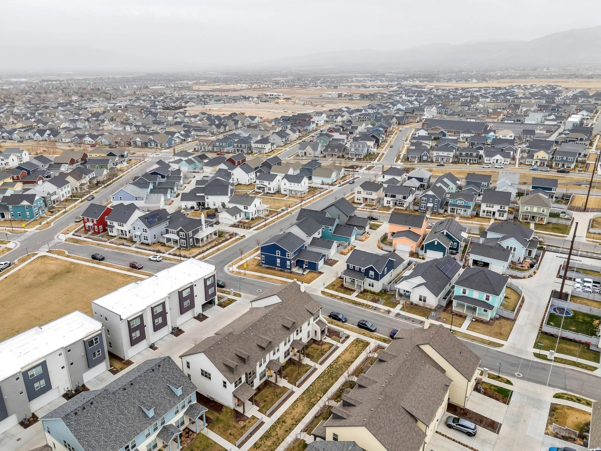 Aerial overview of property's location featuring nearby suburban area