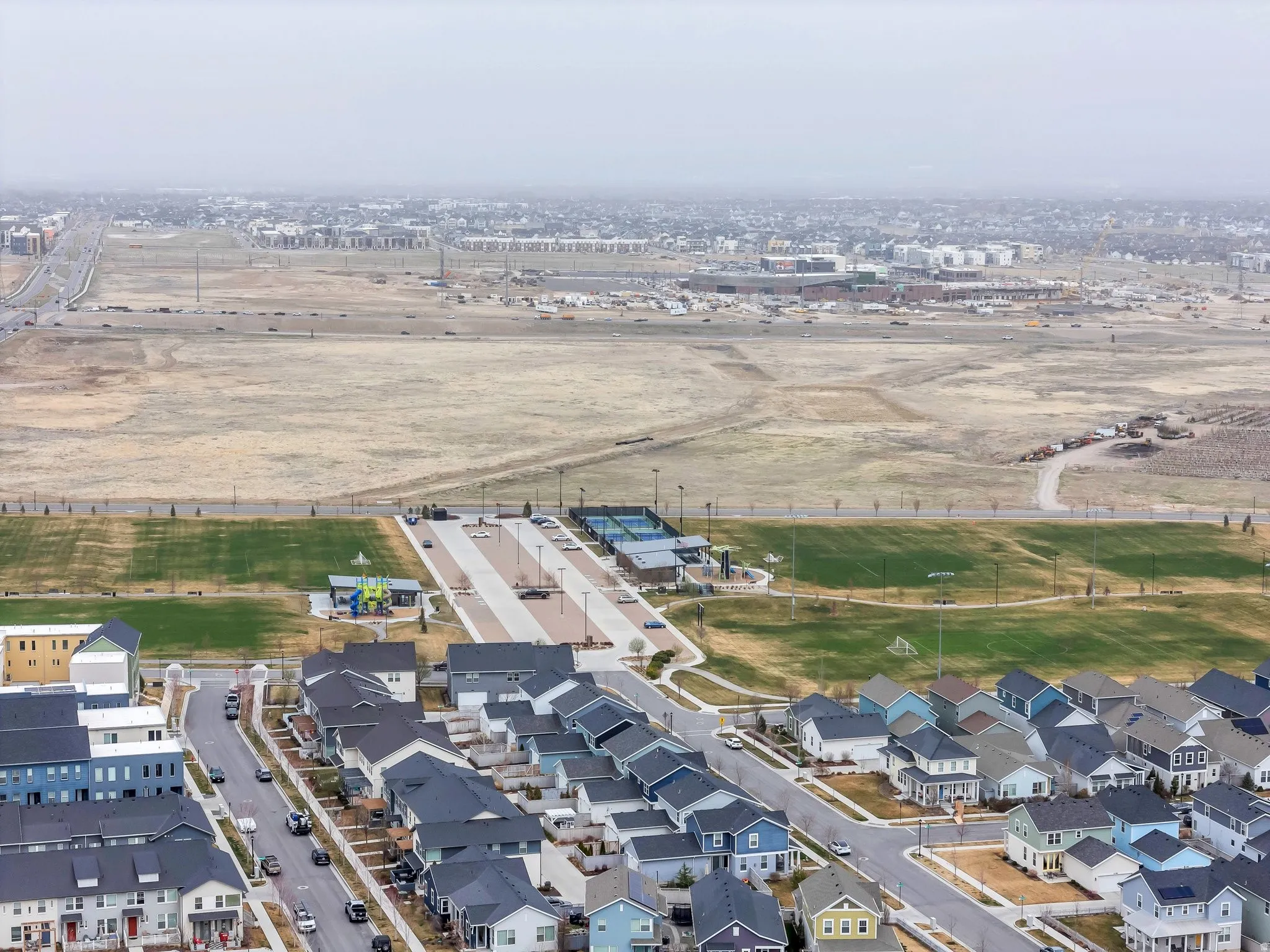 View of property location with nearby suburban area