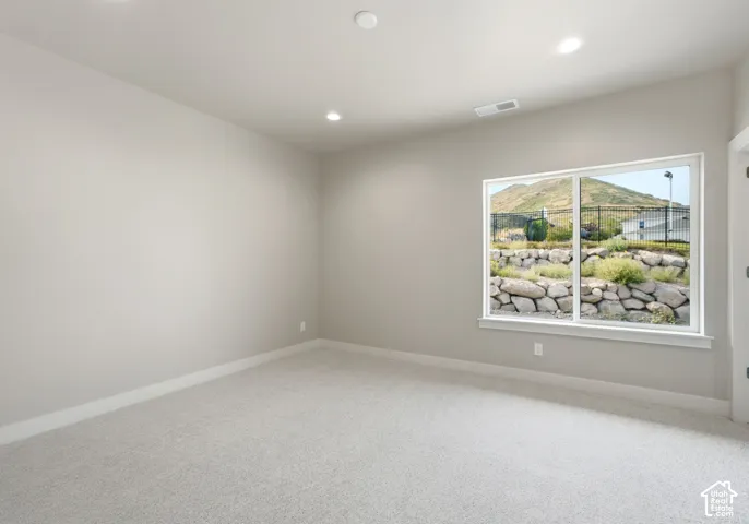 Oversized bedroom with walk in closet and lots of natural light