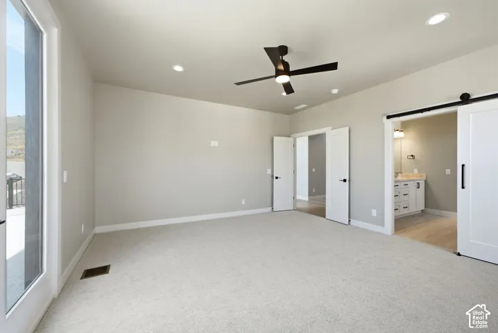 Large Primary Bedroom on main floor w/door leading to deck.