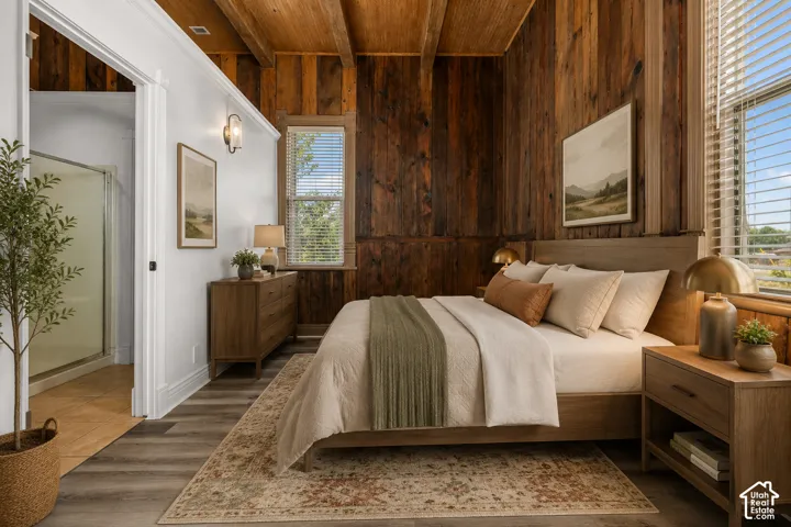 Feature wall with vertical wood paneling and matching wood-paneled ceiling