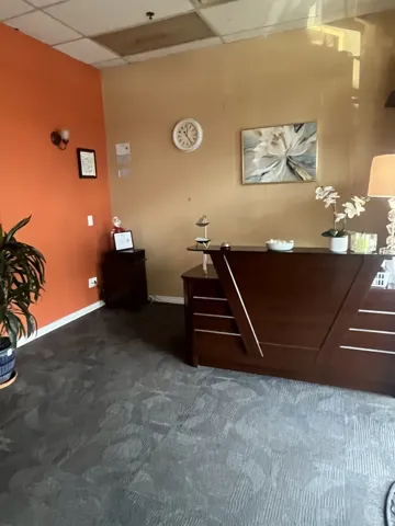 Reception featuring a paneled ceiling