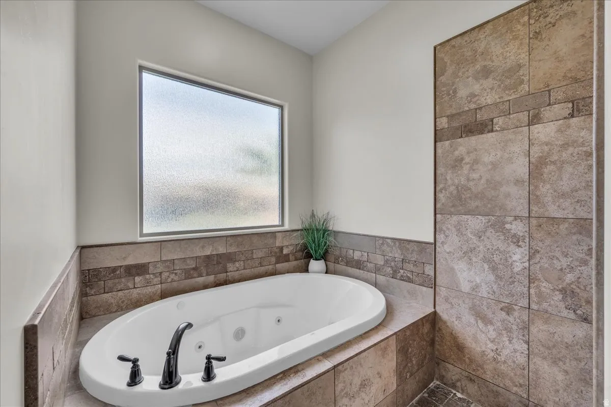Bathroom featuring a whirlpool tub