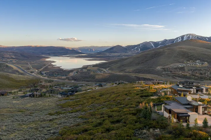View of mountain background featuring a nearby body of water
