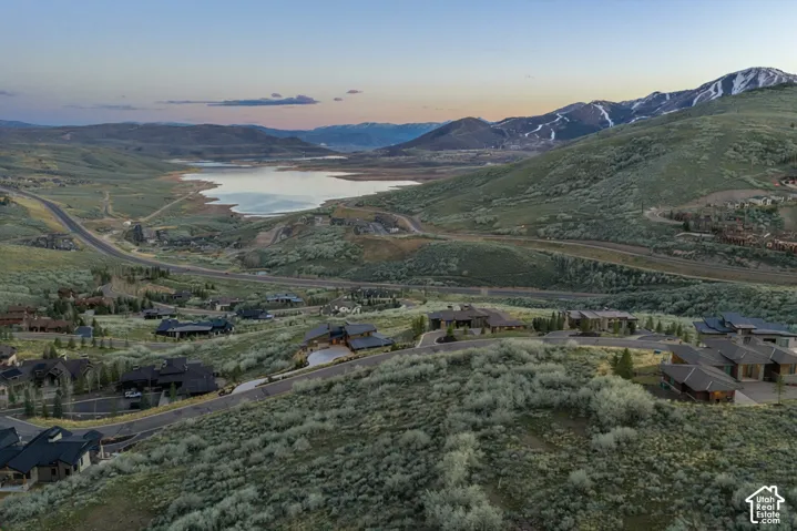 Mountain view featuring a nearby body of water