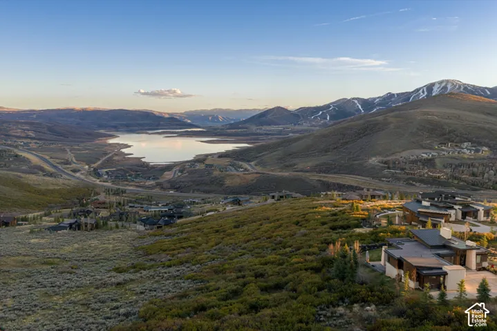 View of mountain background featuring a nearby body of water