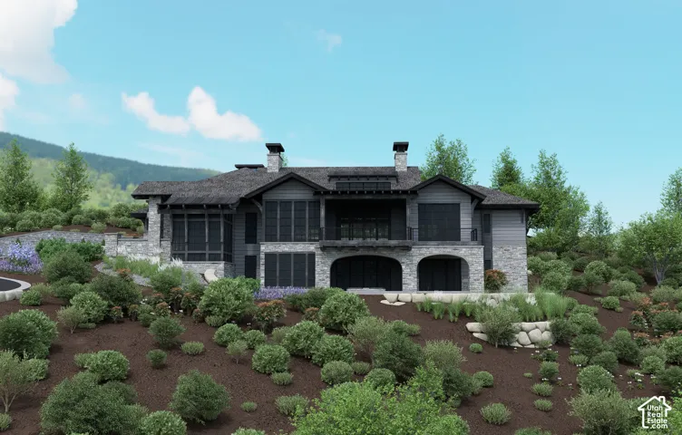 Stone and siding exterior with dark trim accents