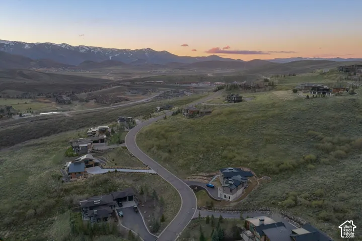 Aerial view of sparsely populated area with mountains