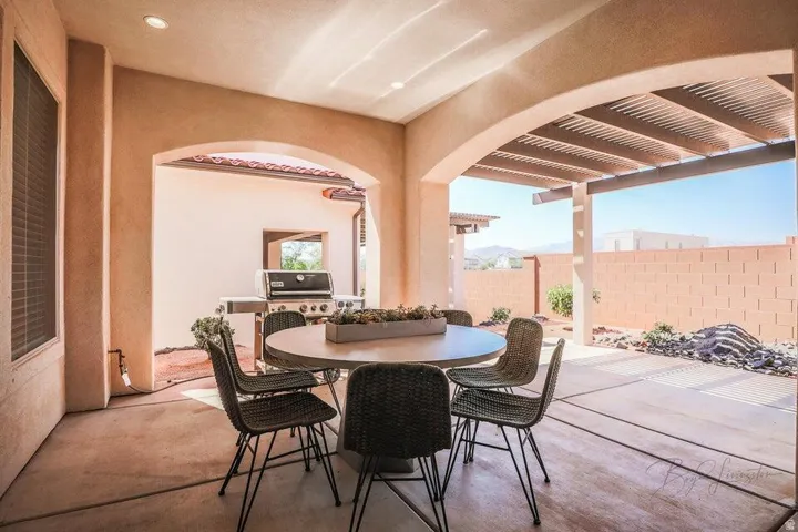 View of patio / terrace featuring outdoor dining area, a pergola, and area for grilling