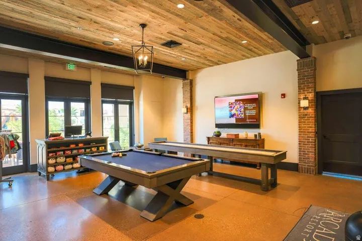 Playroom featuring billiards, a wooden ceiling with exposed beams, and recessed lighting