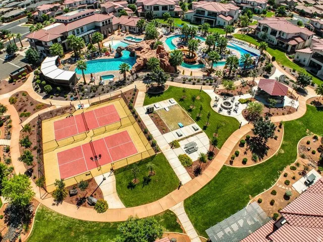 Aerial perspective of suburban area with a pool