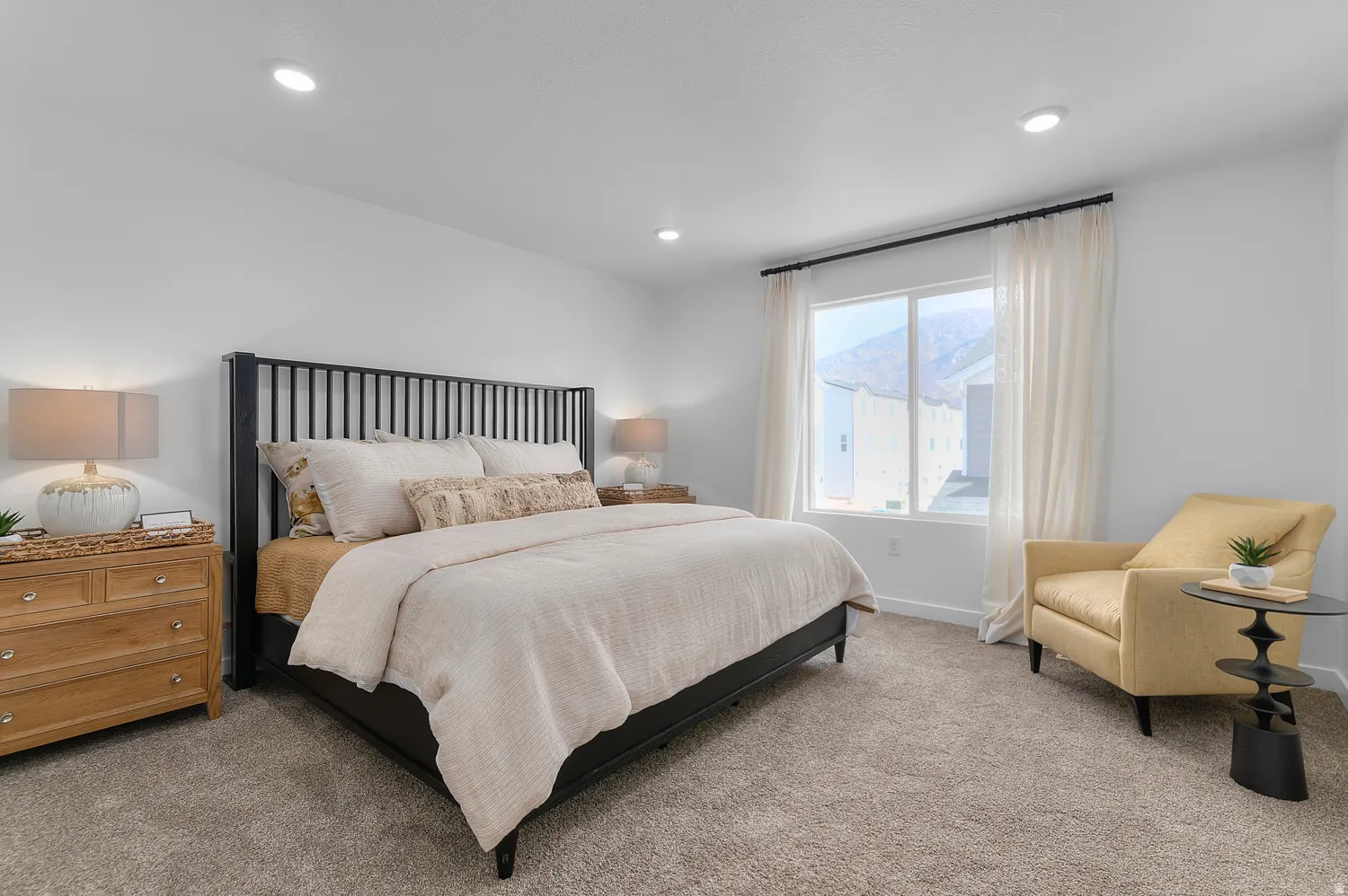 Carpeted bedroom featuring baseboards and recessed lighting