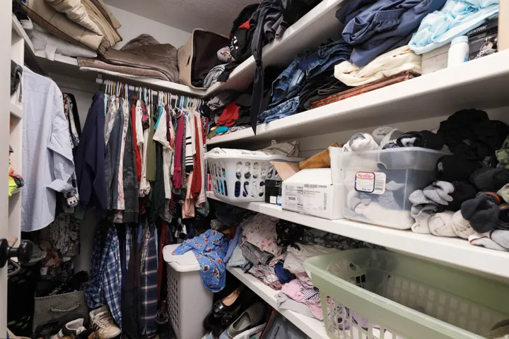 Primary Bedroom walk in closet