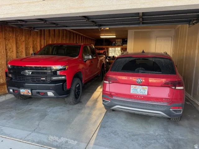 Garage featuring wood walls