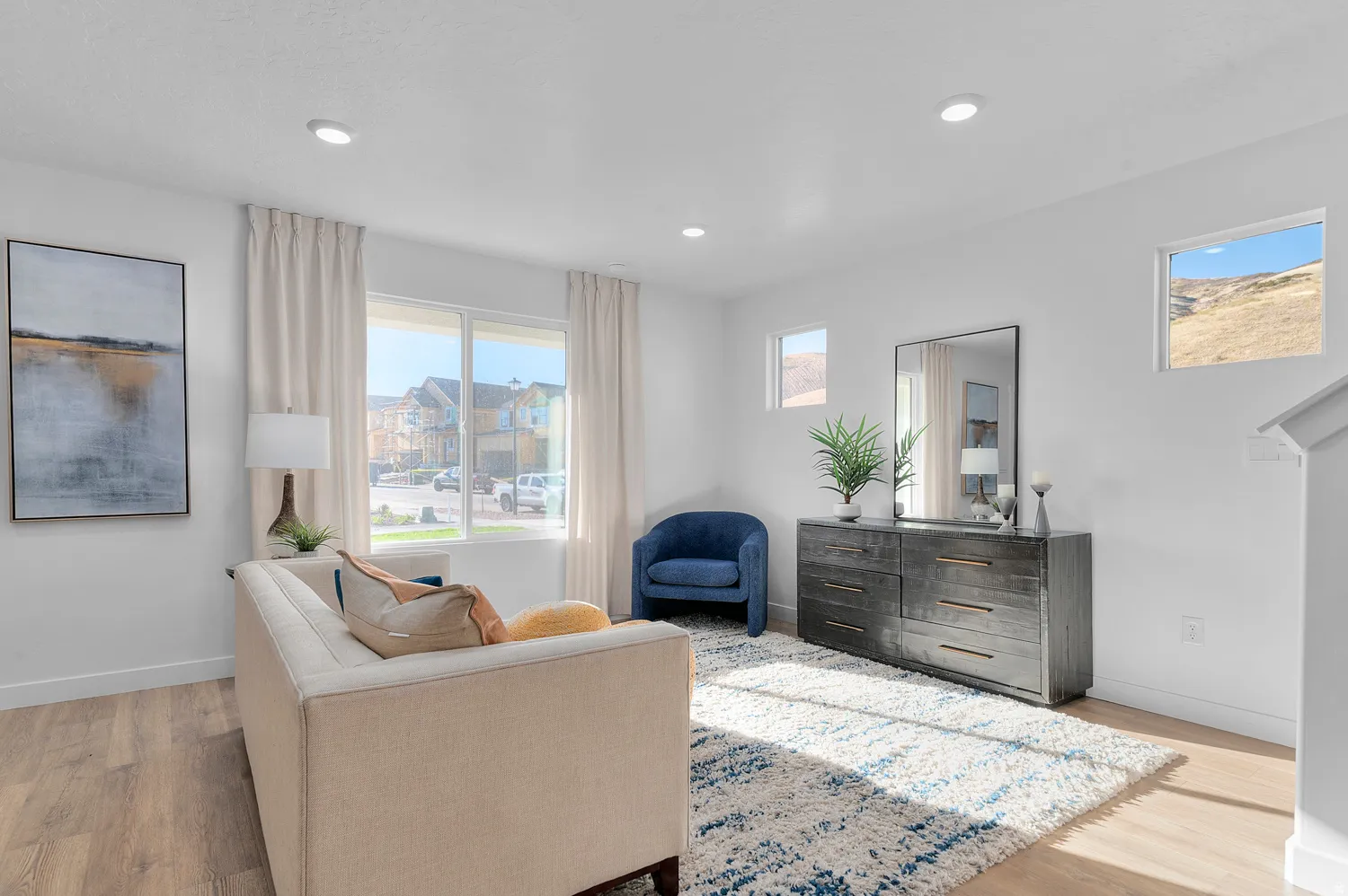 Sitting room featuring light wood-style floors and recessed lighting