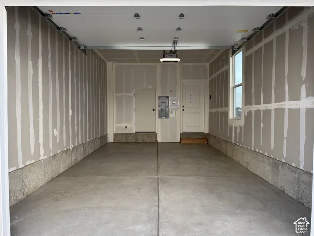 Garage featuring electric panel