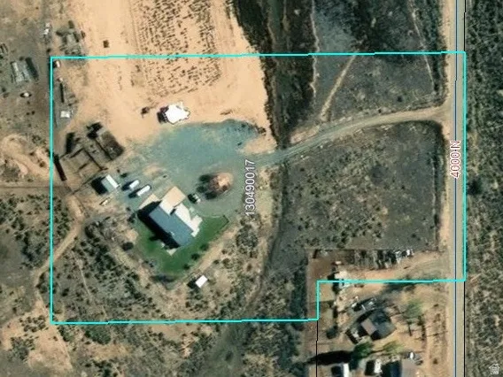 Aerial overview of property's location featuring property boundaries highlighted