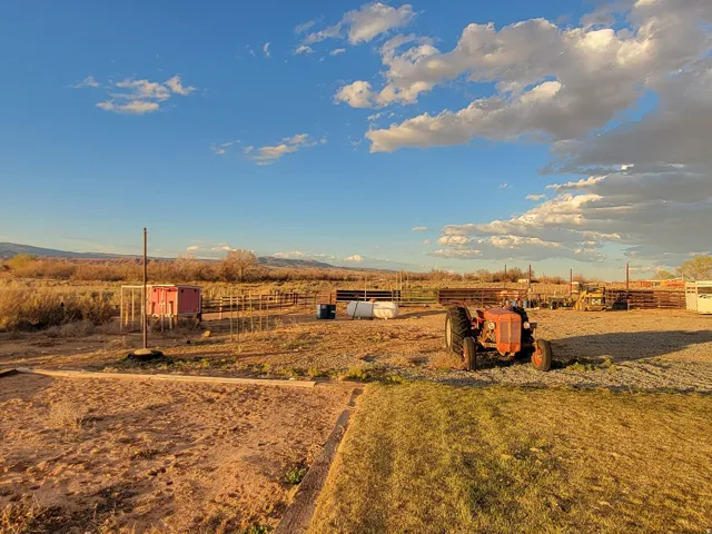 View of yard with a rural view