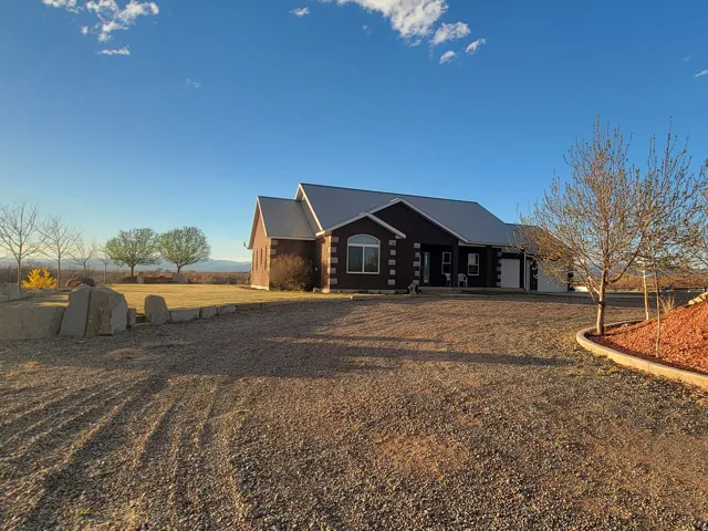 View of front of property featuring driveway