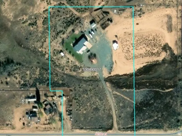Aerial overview of property's location with property boundaries highlighted