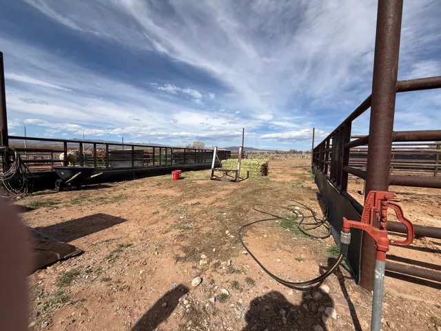 View of yard with an exterior structure and an outbuilding