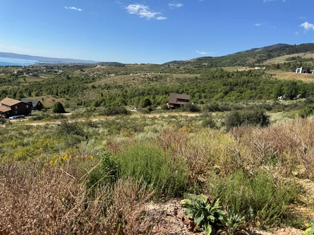 View of mountain backdrop with rural landscape