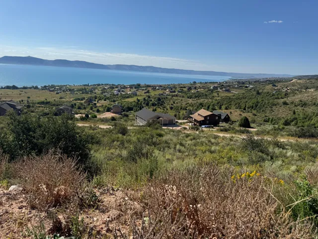 View of mountain backdrop featuring a large body of water