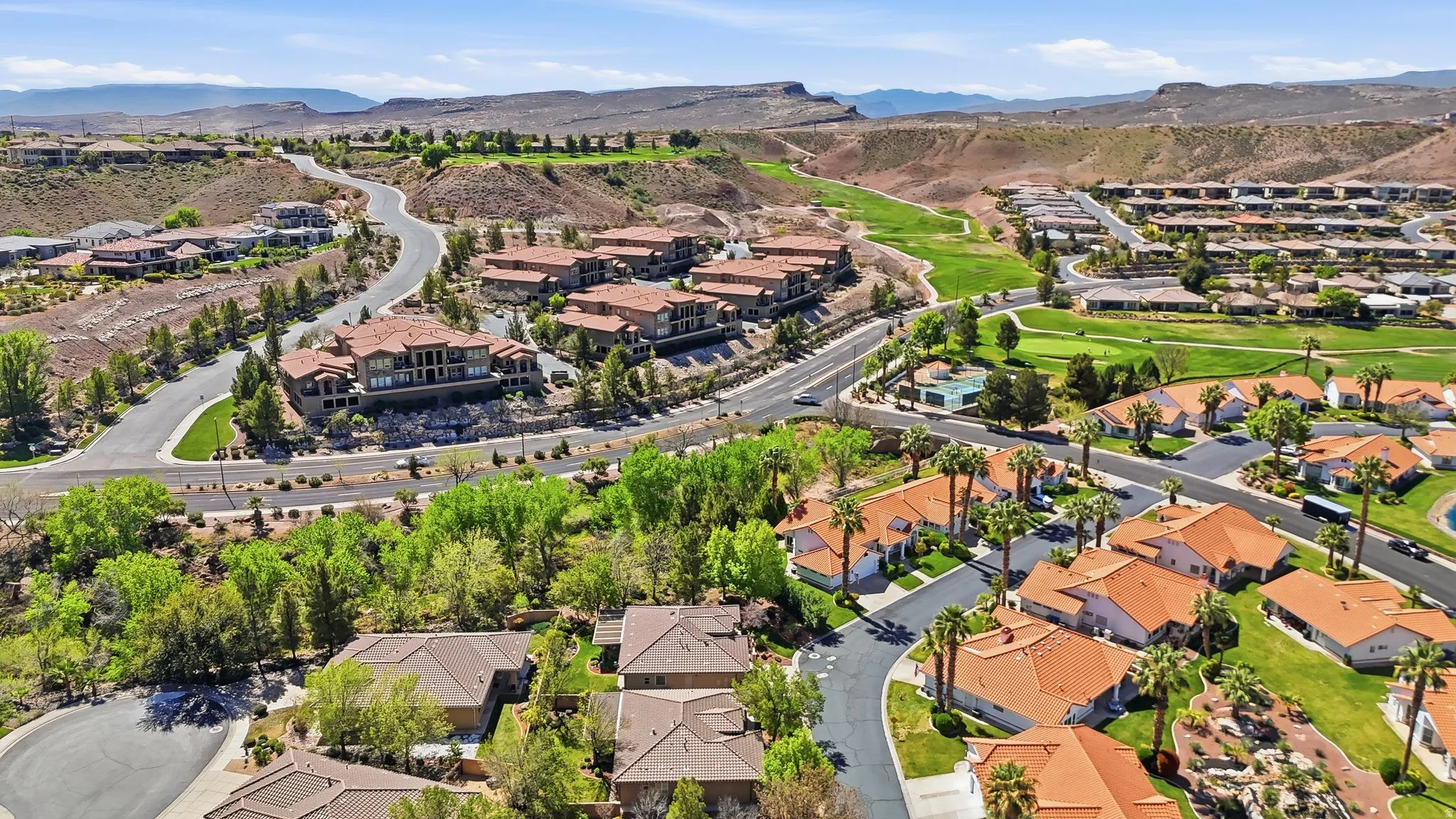 Aerial perspective of suburban area with a mountain backdrop