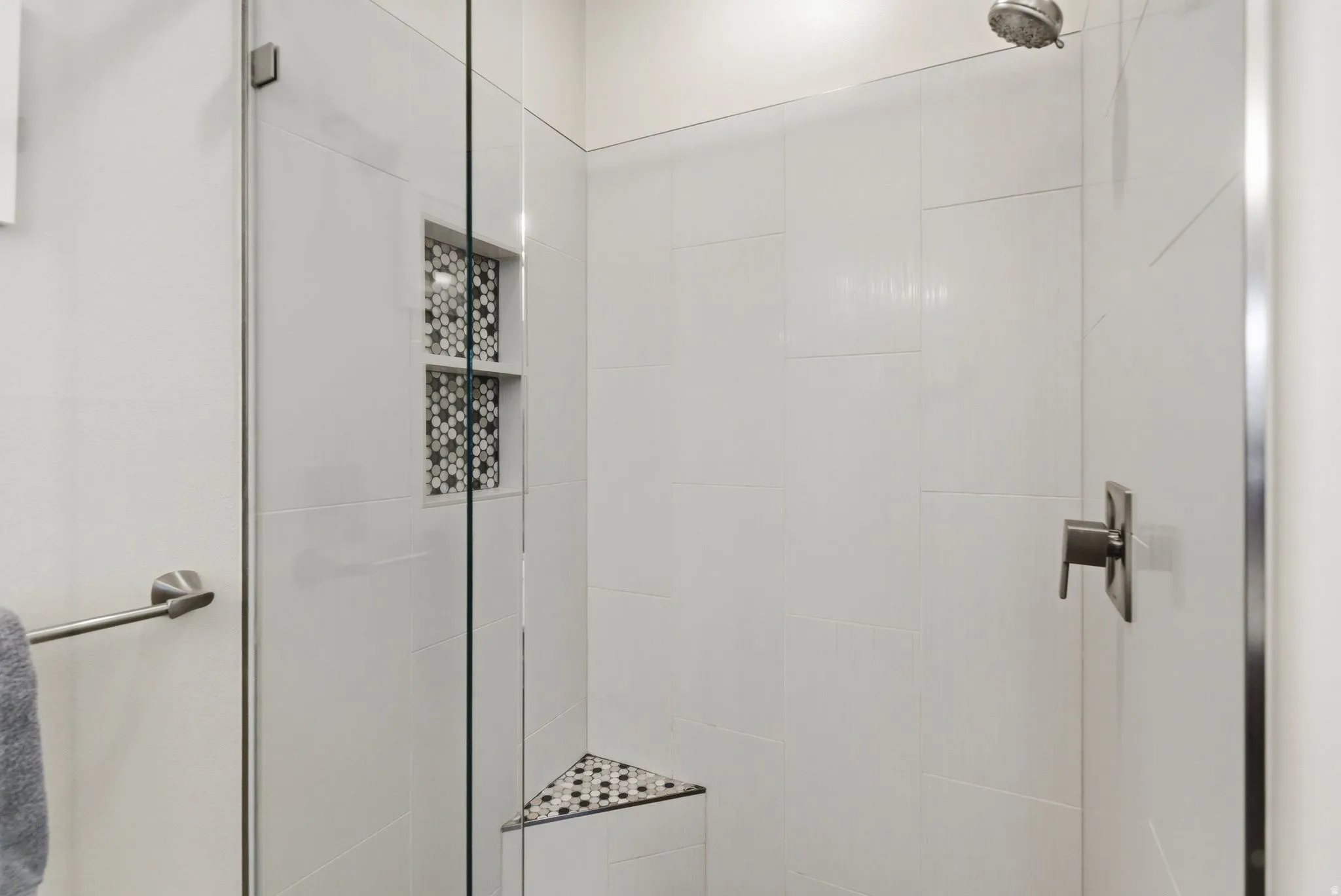 Full bathroom featuring a shower stall