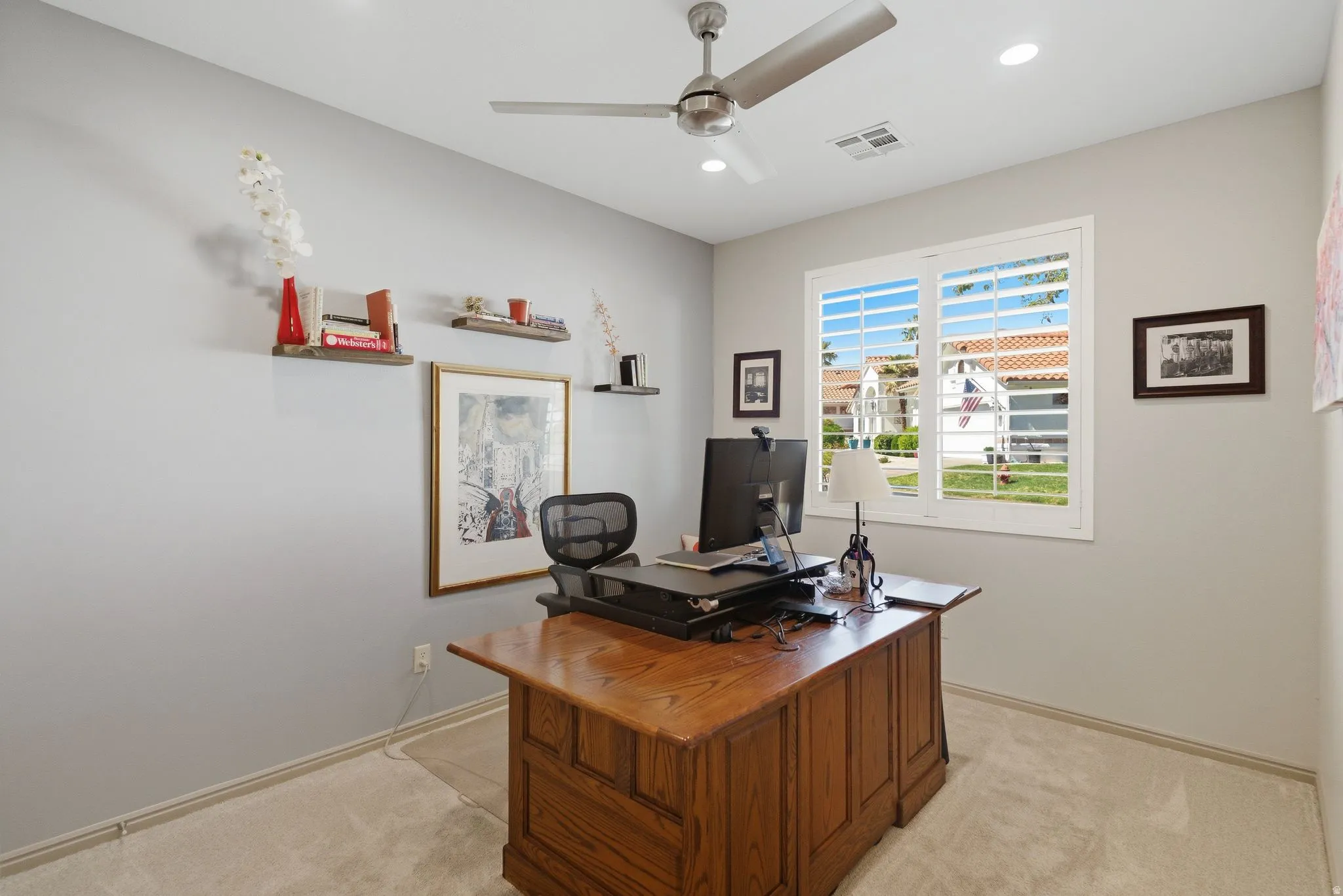 Office featuring light colored carpet, a ceiling fan, and recessed lighting