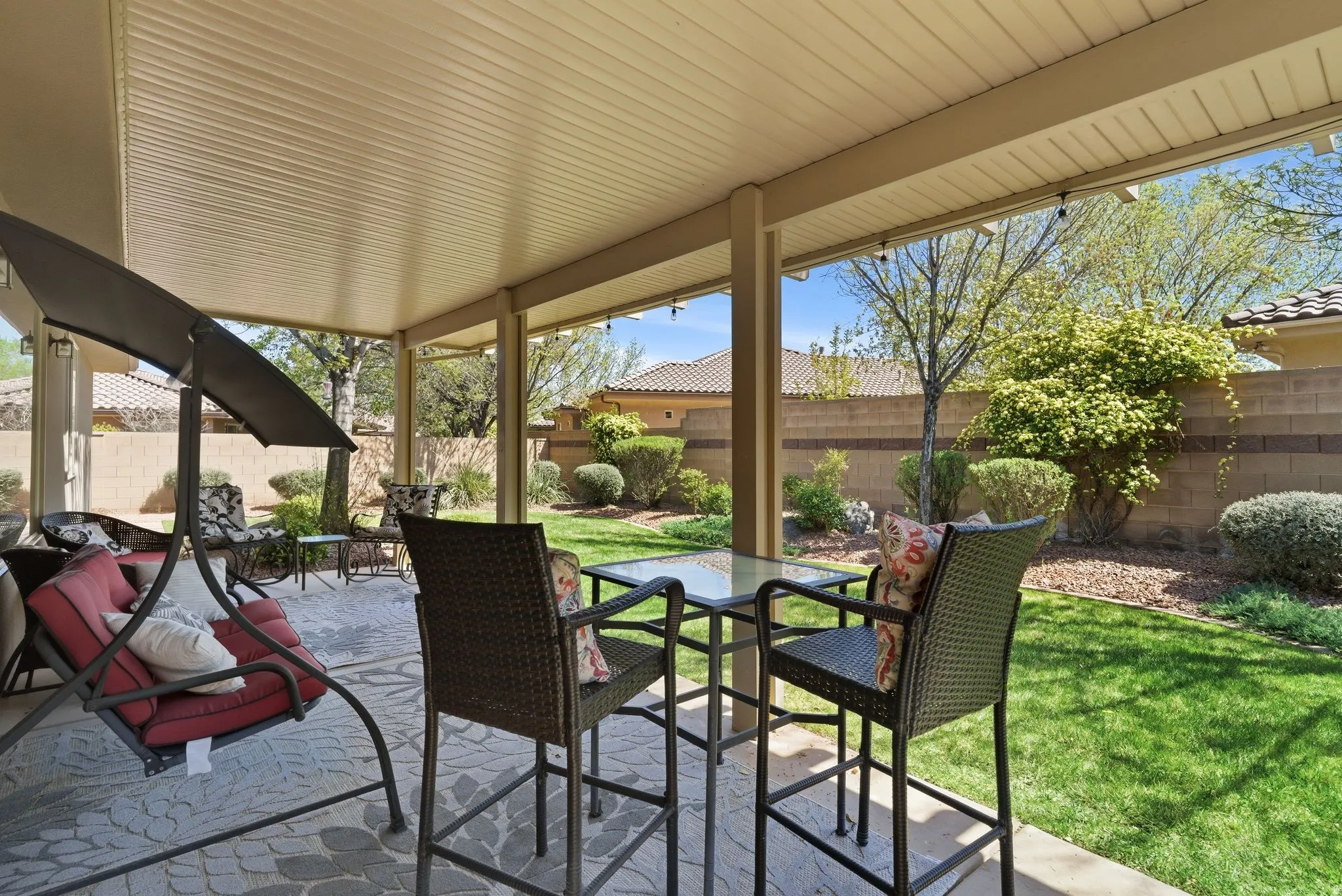 Fenced backyard featuring a patio and outdoor dining space