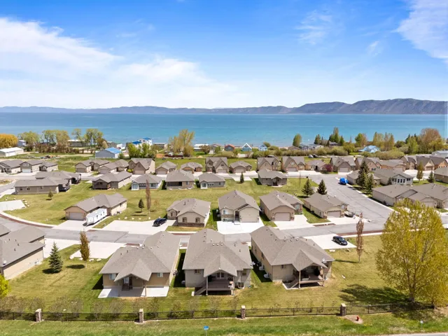 Aerial view of residential area with a water and mountain view