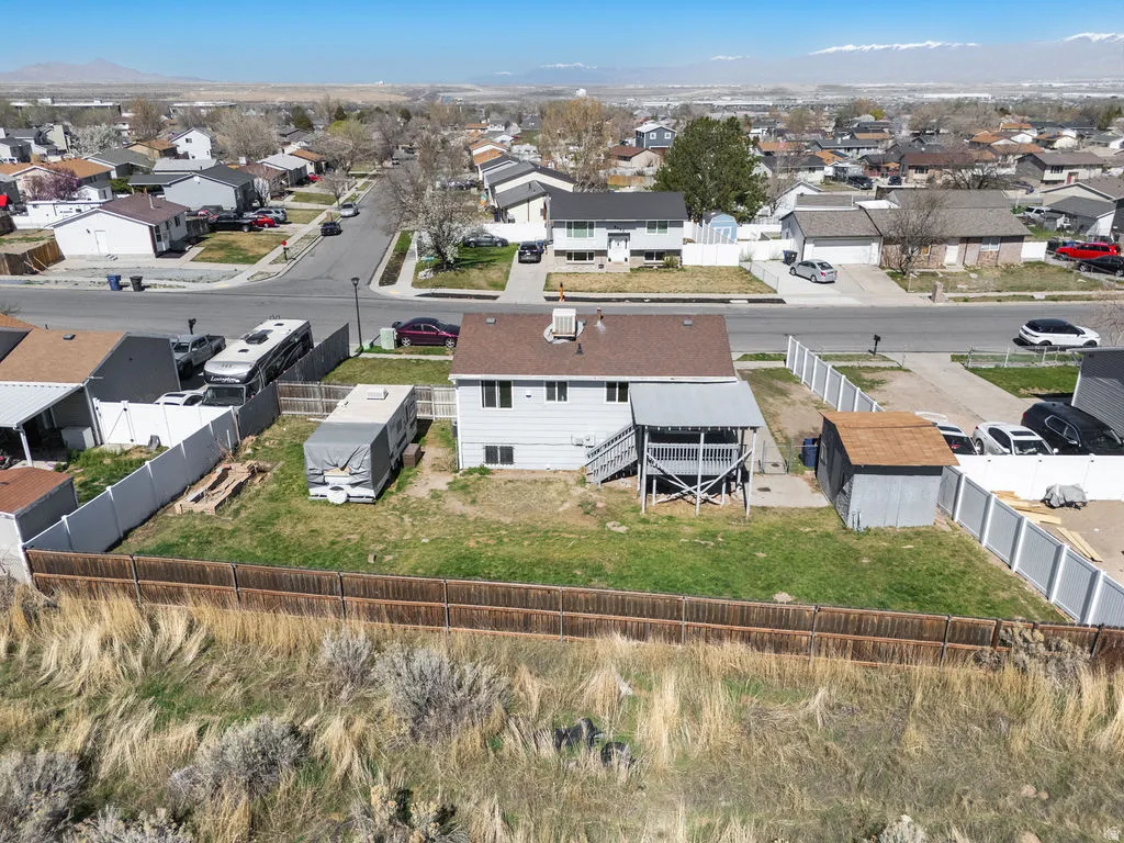 Aerial view of residential area with a mountain backdrop