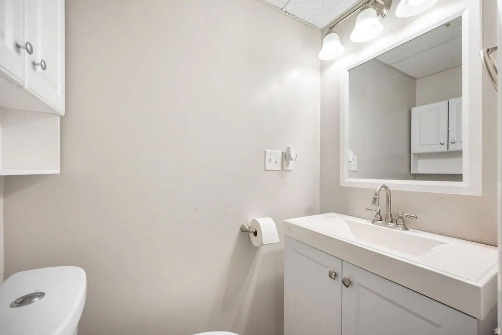 Half bath with toilet and vanity