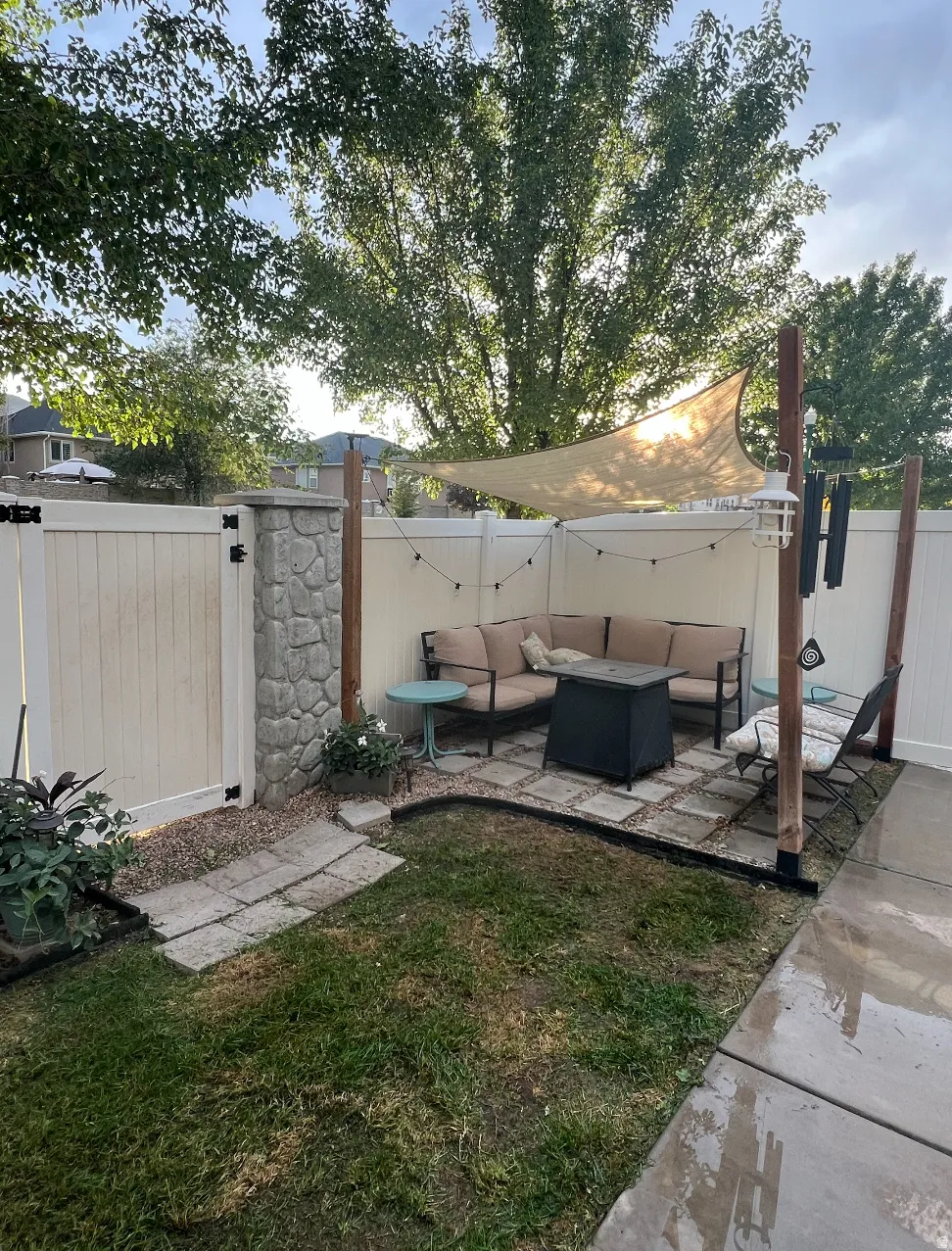 How the backyard previously look and could looked with new plants. Sunshade is included with sale.