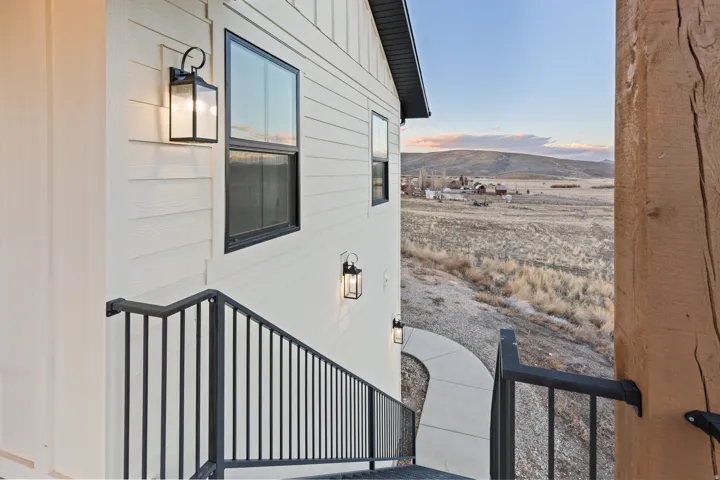 Main entry is through the second floor covered deck