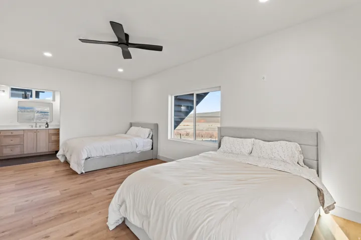 AUD Bedroom. Large enough for built in bunk beds. Queen over Queen