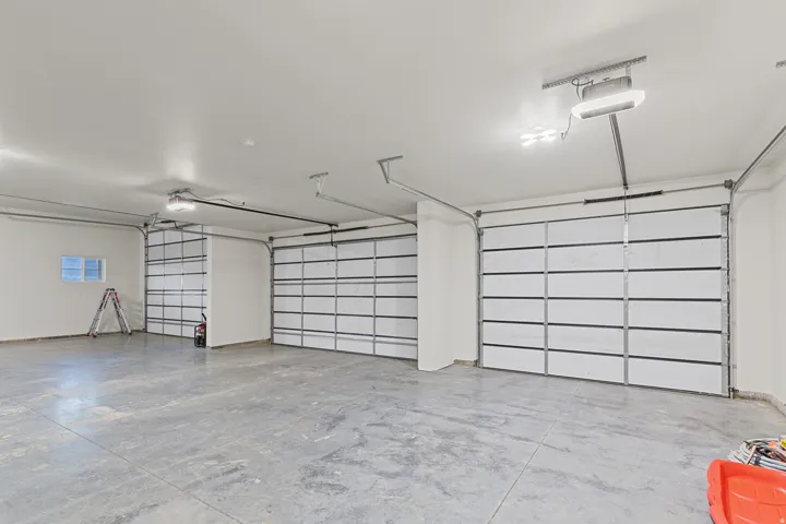 Expansive Garage. over 2000sq feet. 6 car capacity and RV height pull through.