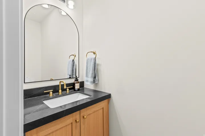 Half bath right off garage entrance.