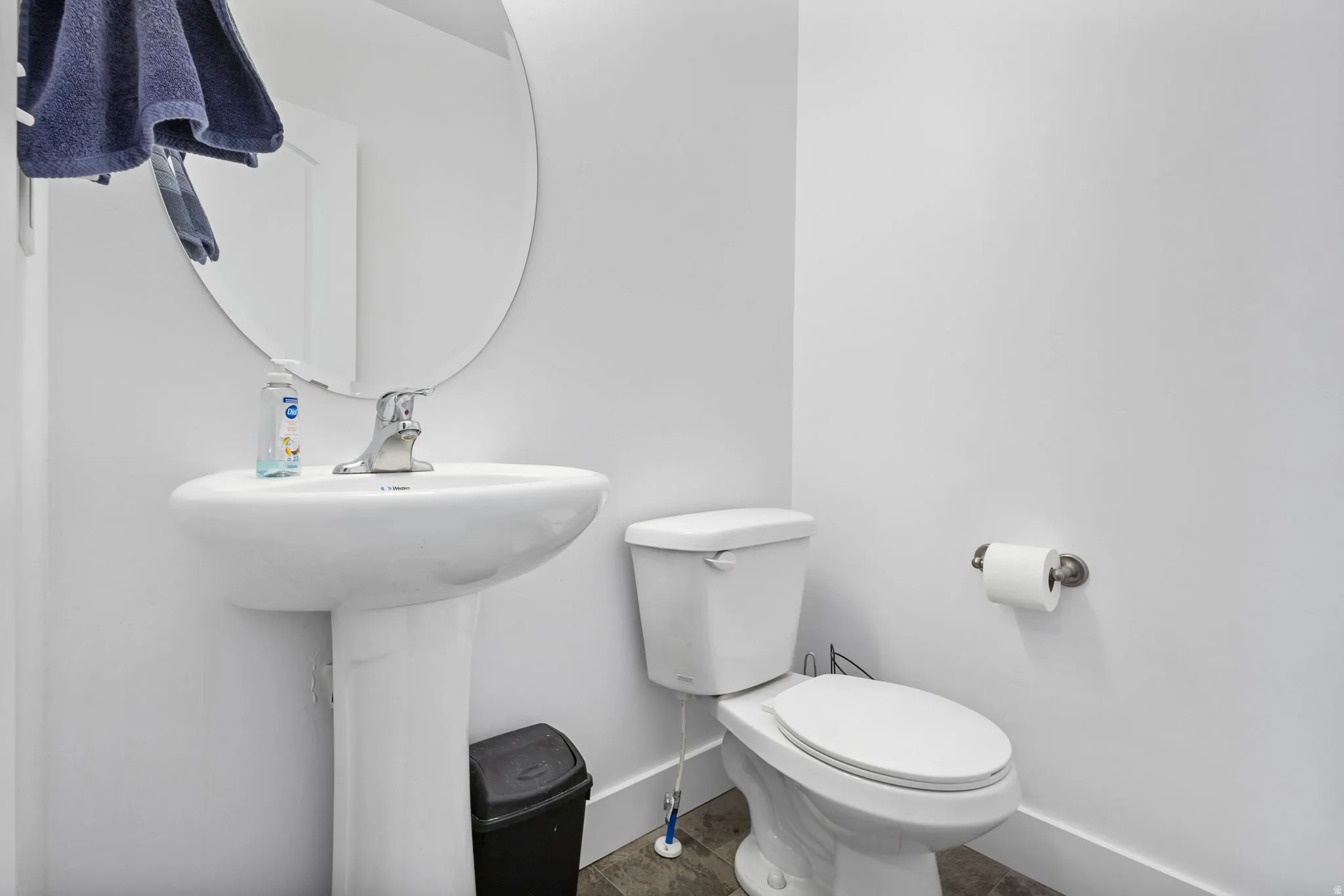 Bathroom with baseboards and toilet