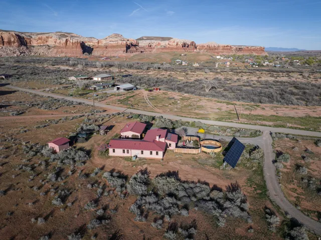 Aerial overview of property's location with mountains and rural landscape