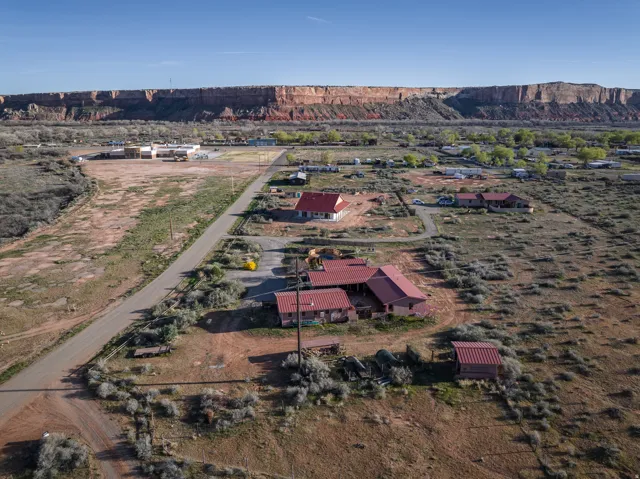Aerial view of property and surrounding area featuring rural landscape