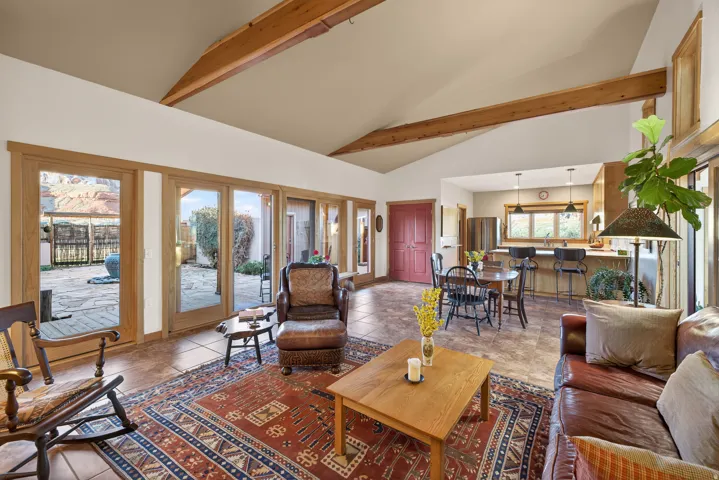 Living room featuring lofted ceiling