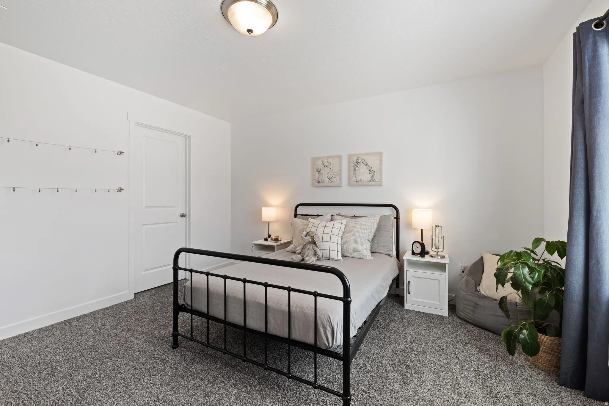 Bedroom with dark carpet