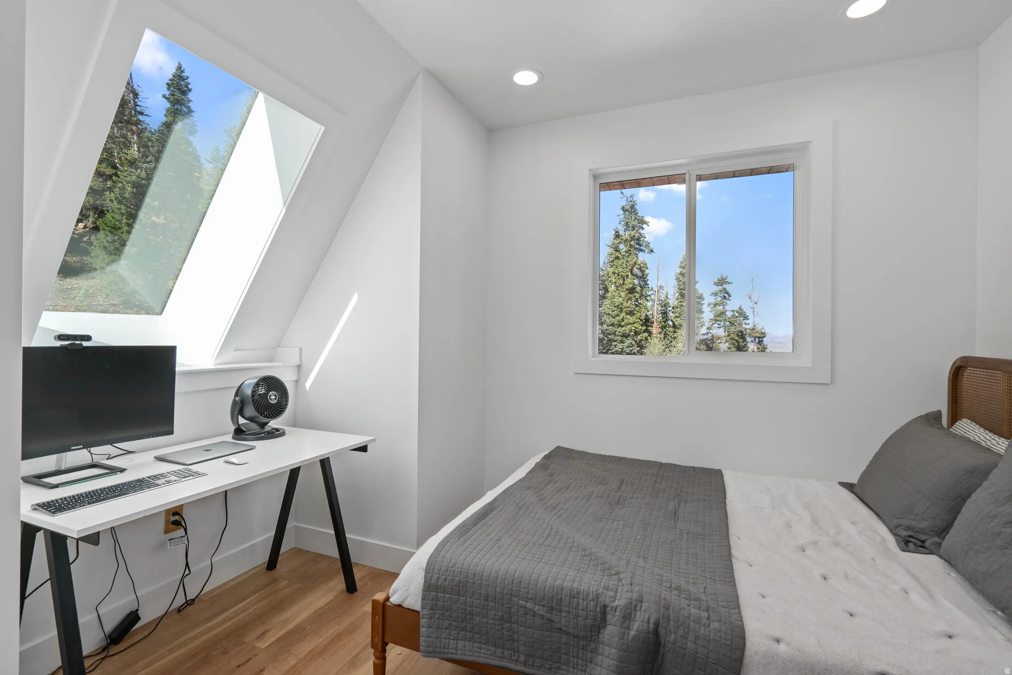 Bedroom featuring a desk, light wood-style floors, and recessed lighting