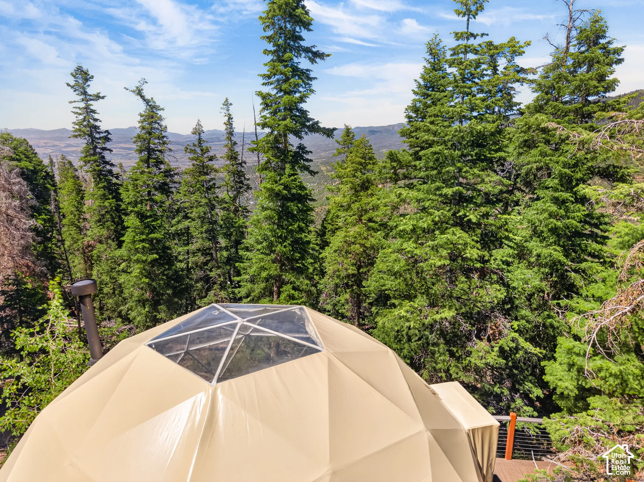 Geodesic dome structure featuring a clear central skylight